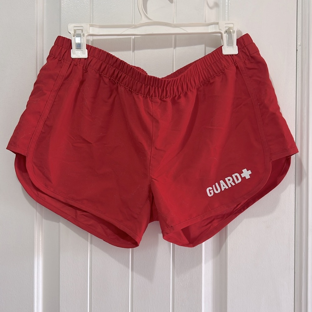 NWT Sporti Red Lifeguard Shorts with white lifeguard writing.